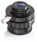 A black camera lens with a silver rotary knob and blue-coated lens, sitting on a white surface with a subtle shadow.