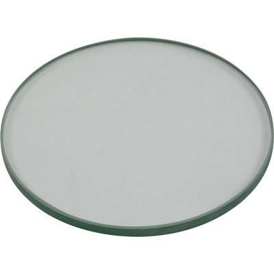 A flat, round glass disc or lens lying on a surface. It has a slightly greenish tinge.