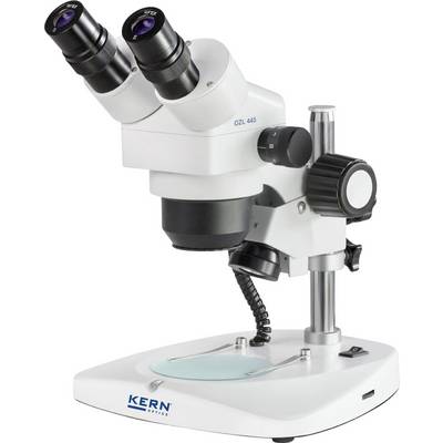 Microscope with two eyepieces and sturdy stand, viewed from the side. Brand name 'KERN' visible on the base.