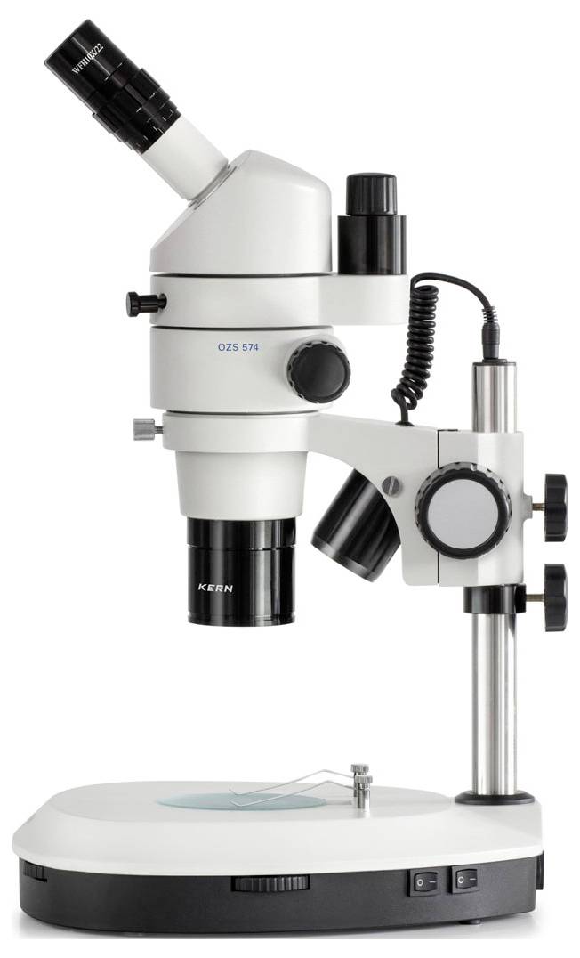 A white stereo microscope with black eyepiece and controls stands on a stable base, suitable for scientific investigations.