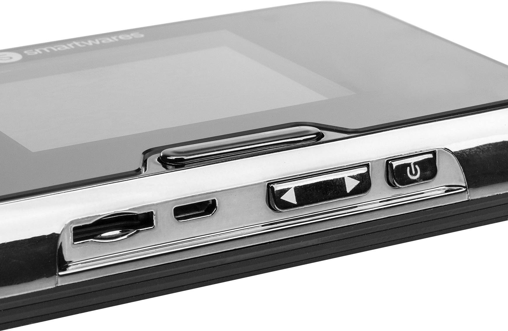 Close-up of an electronic device with power button, USB port and other control elements.