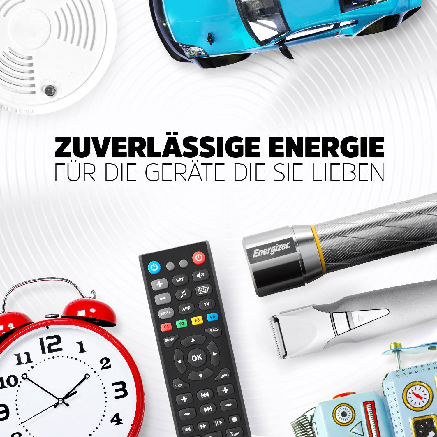 Shown are household devices such as smoke detectors, toy car, alarm clock, remote control, electric shaver and batteries with the text 'Reliable energy for the devices you love'.