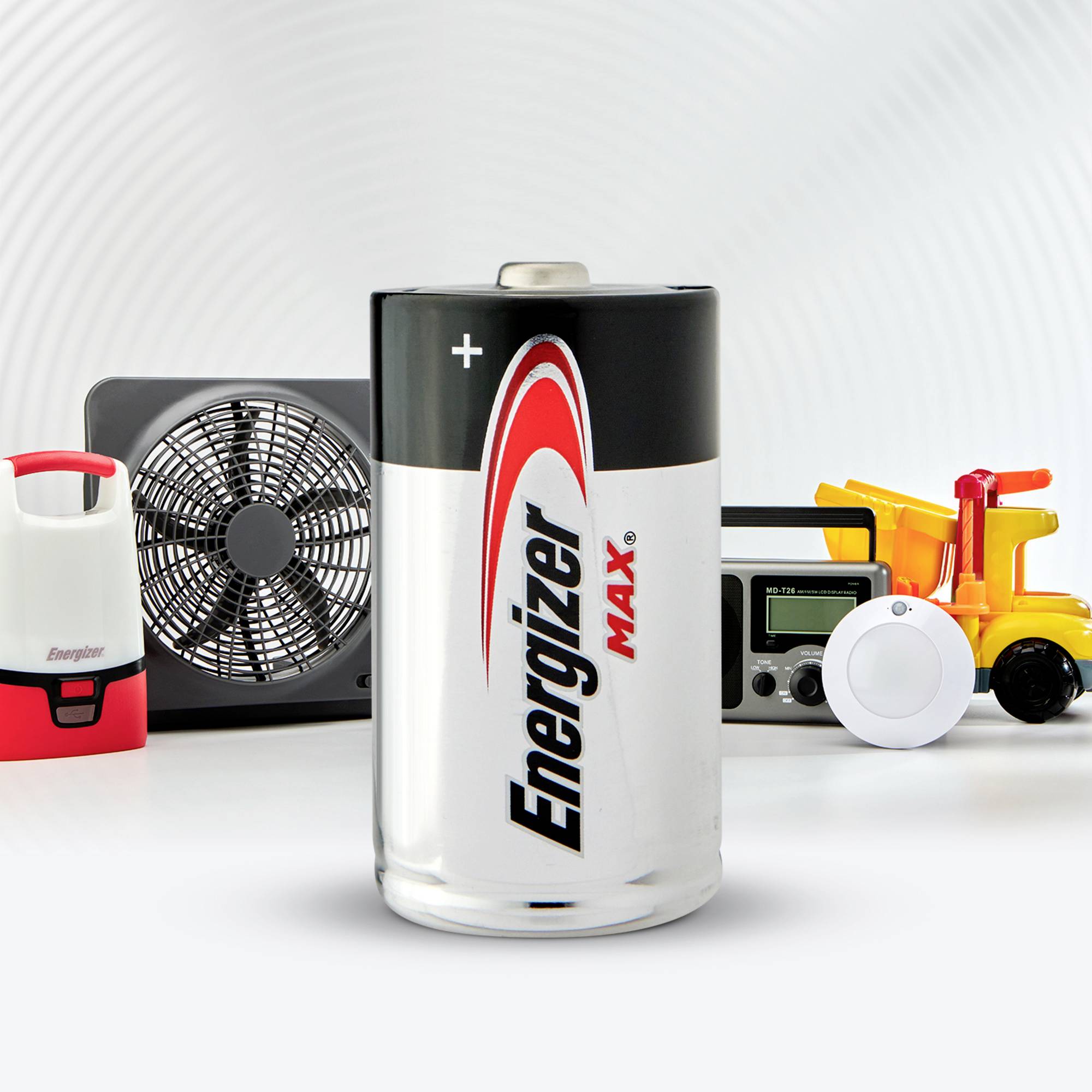 An Energizer battery in the centre, flanked by various household appliances, including a fan and torch.