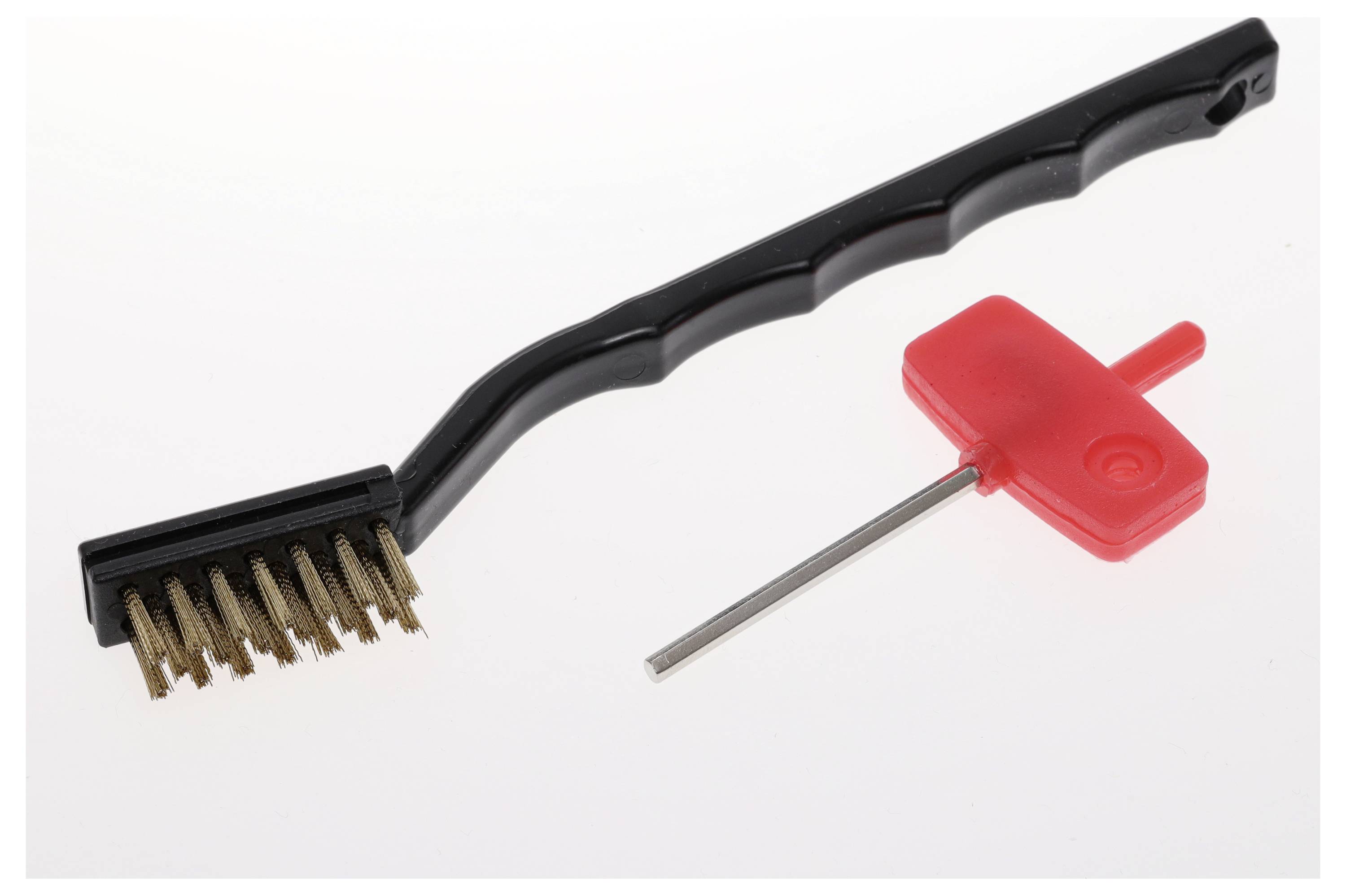 Black cleaning brush with metal bristles and red Allen key on white background, likely for maintenance work.