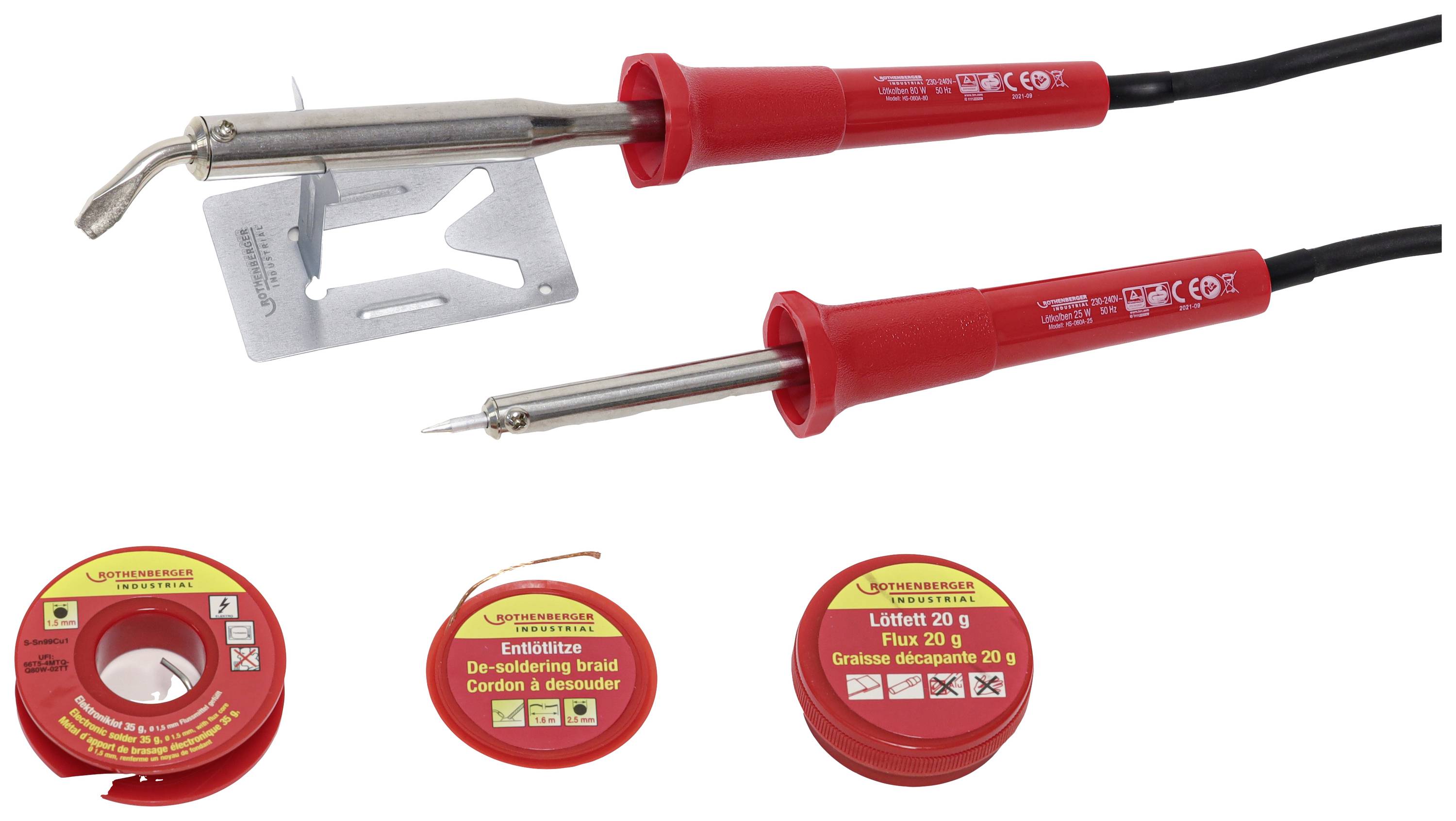 Two soldering irons and accessories: desoldering braid, flux. Upper iron with curved tip, the lower one with straight tip.