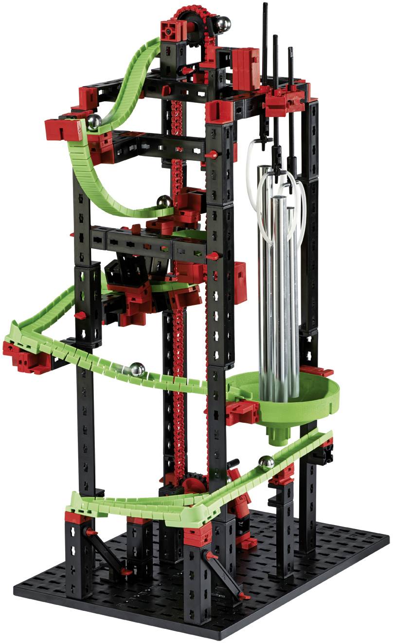 Plastic model depicting a ball run with a lifting mechanism. Balls roll along green tracks on a black frame.