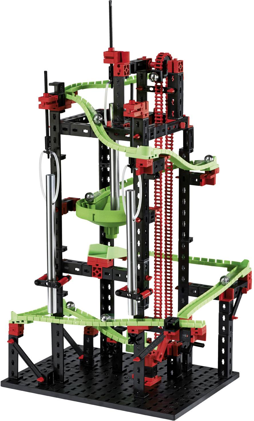 Technical construction kit model made of black and red components with green rails, constructed as a vertical structure with movable elements.
