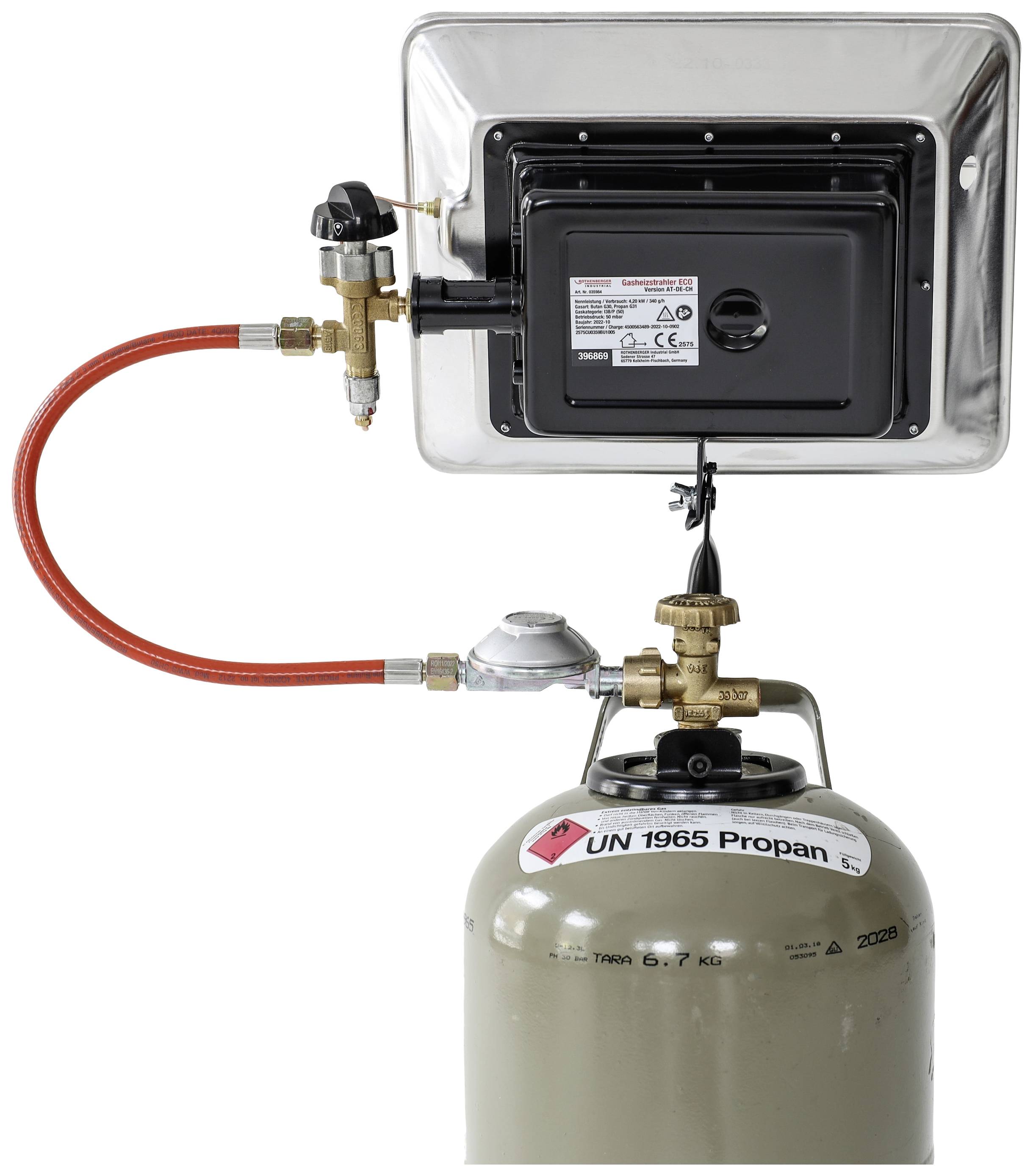 A propane gas heater, mounted on a gas cylinder, shows hoses and valves for connection.
