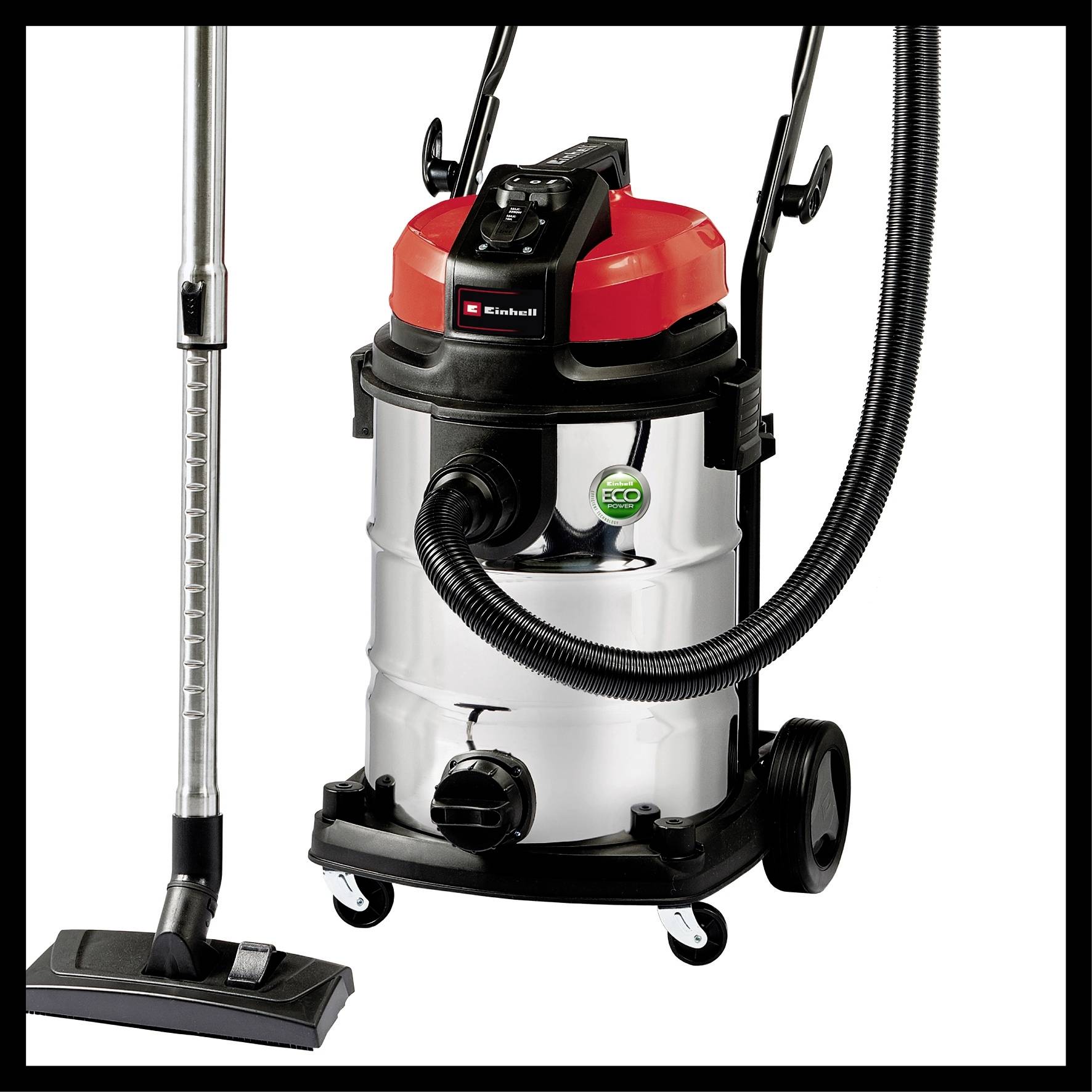A silver industrial vacuum cleaner with a red lid and black hose. Next to it stands a vacuum cleaner tube with a floor nozzle.