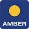 A yellow circle against a blue background with the word 'AMBER' underneath in silver lettering.