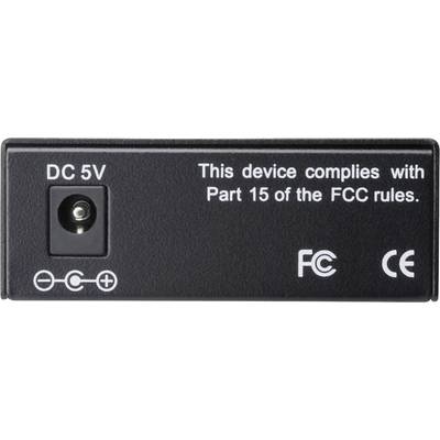 Black power supply with inscription 'DC 5V'. Text: 'This device complies with Part 15 of the FCC rules'. Symbols: FCC, CE.<br><br>(Note: The translation remains the same as the original text, which is already in English)