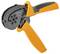 An orange Weidmüller crimping pliers for connecting cables with a hexagonal crimping opening and black grip padding.