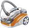 A modern, orange and white vacuum cleaner with a large, transparent container and flexible suction hose, mounted on wheels for easy mobility.