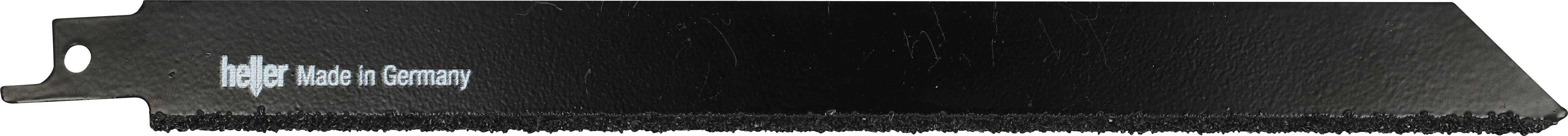 Black jigsaw blade with fine teeth, marked 'Made in Germany'. Suitable for precise cuts in various materials.