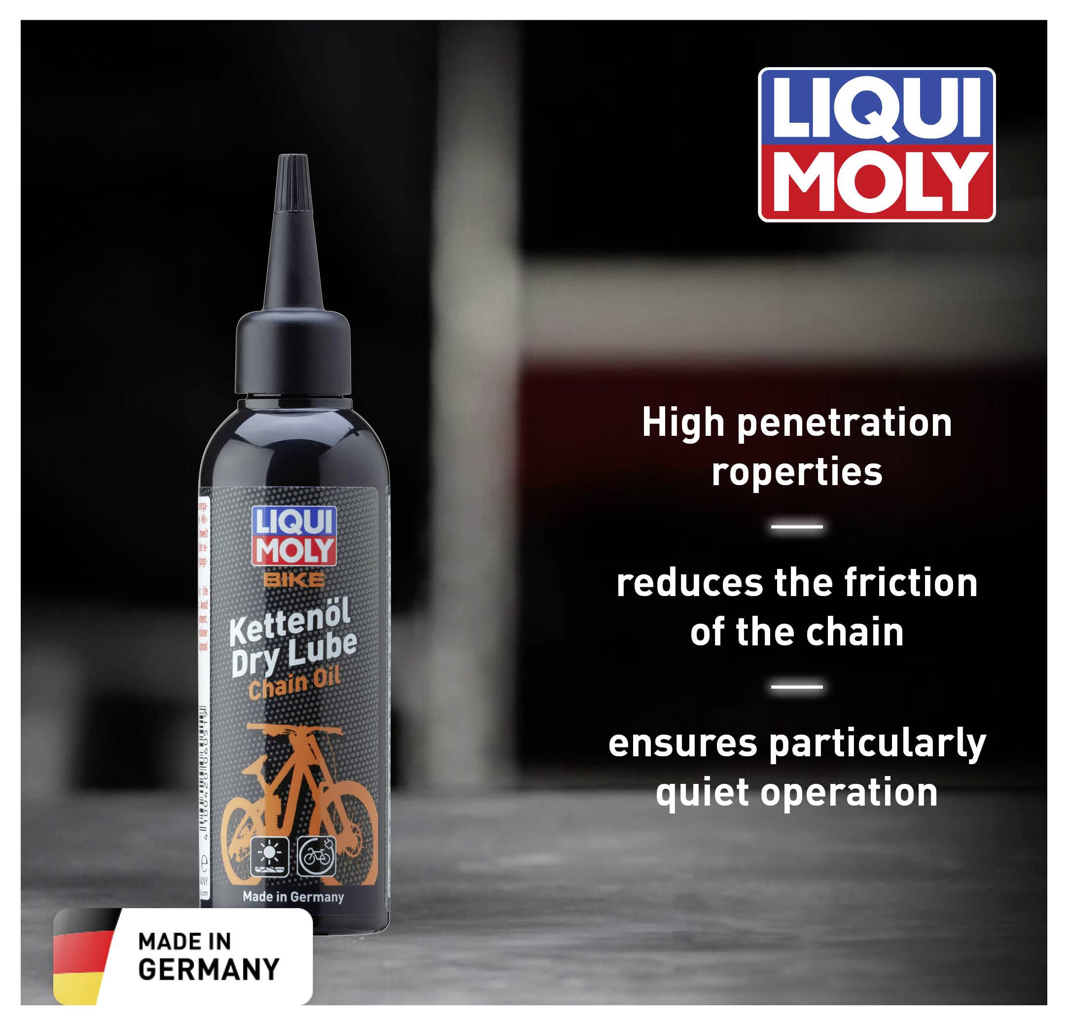 A bottle of LIQUI MOLY chain oil on a table. Text: 'Excellent corrosion protection. Noticeably reduces chain friction. Ensures exceptional running smoothness.' Made in Germany.