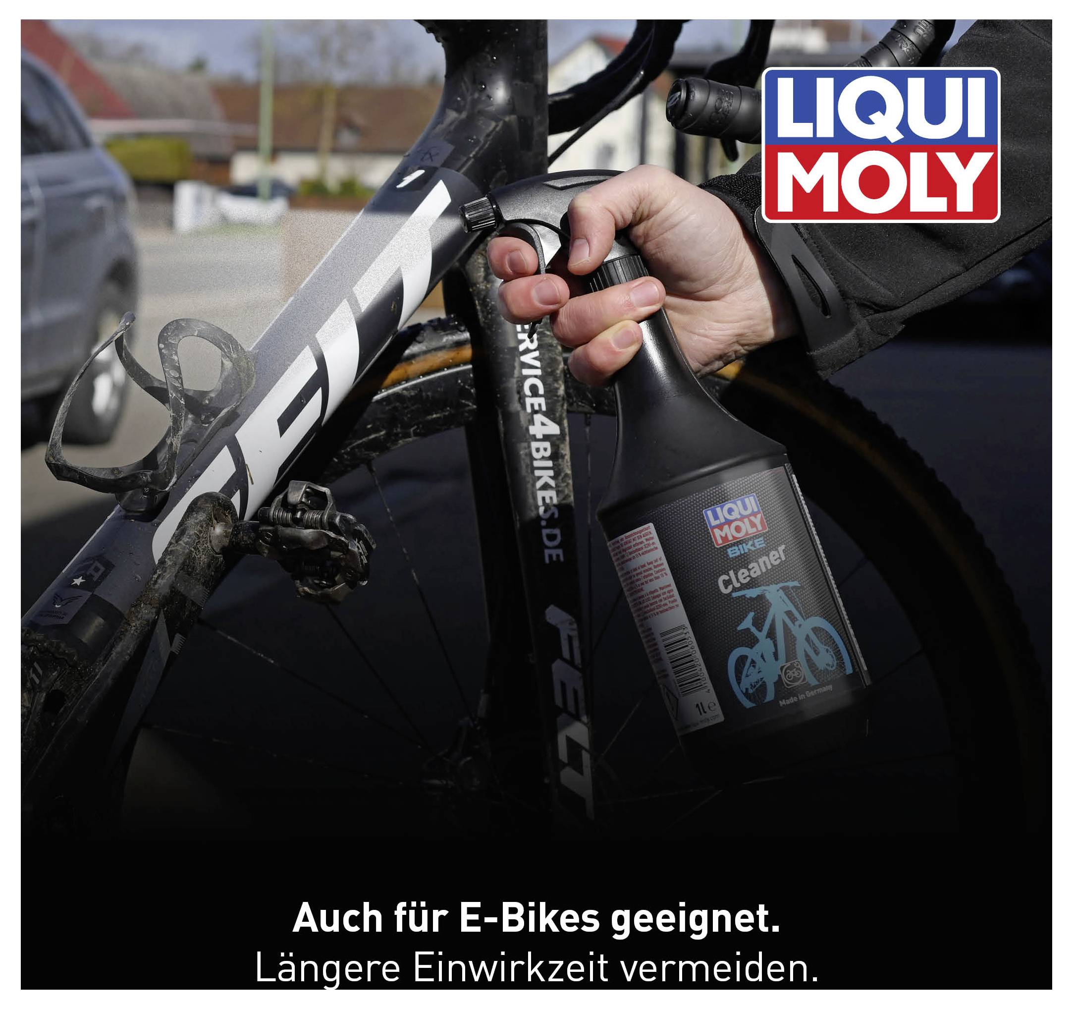 A bicycle is being cleaned with 'Liqui Moly Bike Cleaner'. The text states: 'Suitable for e-bikes as well. Avoid prolonged exposure.'