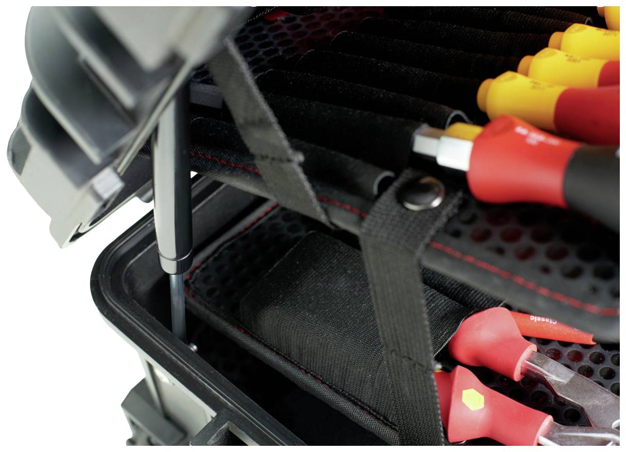 A tool box with various screwdrivers and tools. The handles are red and yellow, and some tools are secured in holders.