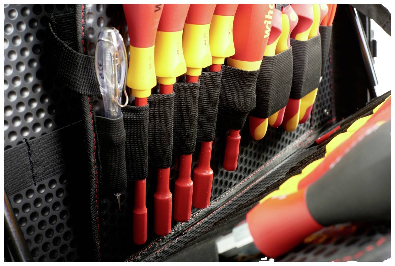 A set of colourful screwdrivers and a voltage tester in a tool bag, neatly arranged in elastic loops.
