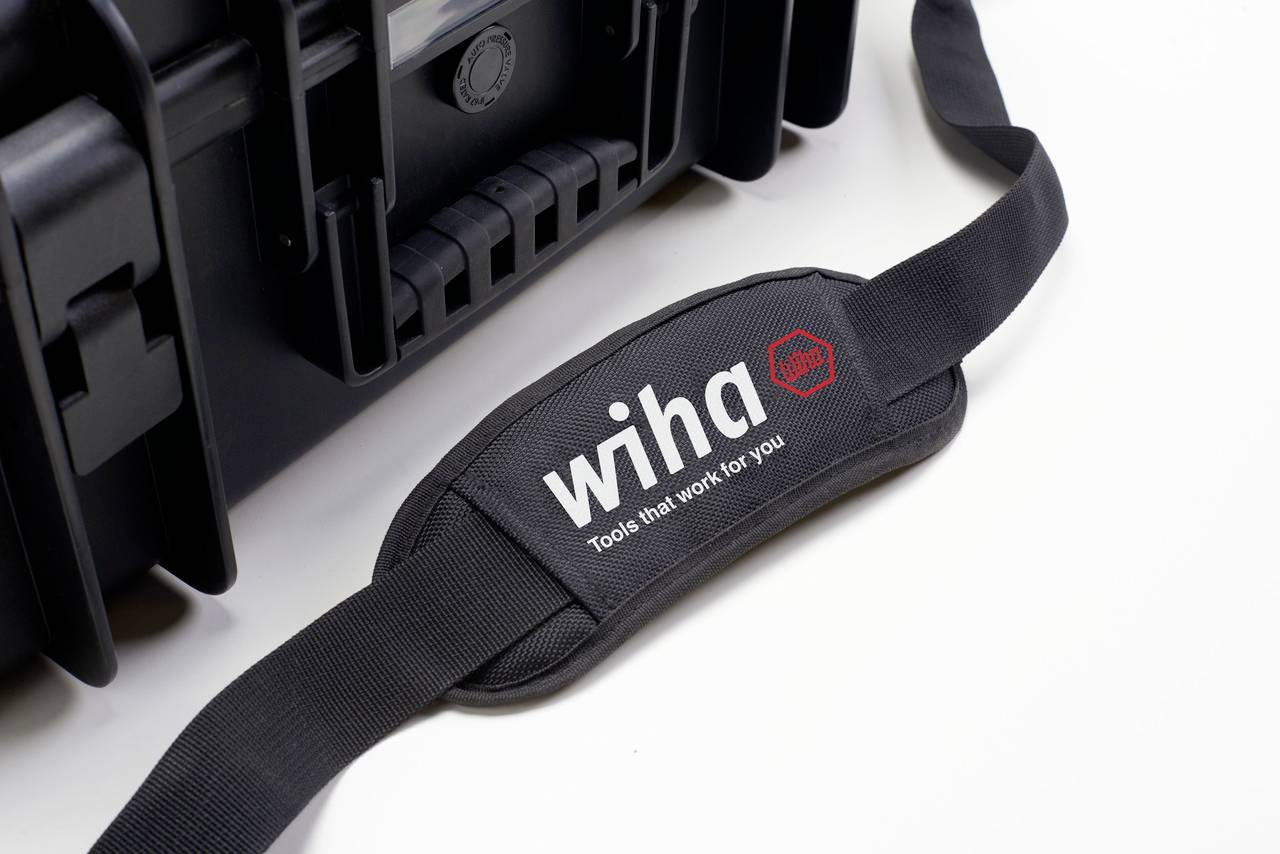 Black toolcase with the inscription 'wiha - Tools that work for you' on a carrying strap.