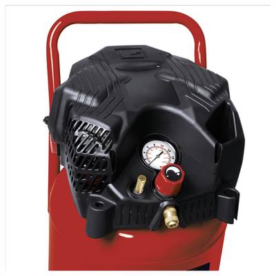 Portable air compressor with black motor housing, pressure gauge, and brass connectors on a red tank.