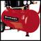 Red air compressor with two pressure gauges on top. The brand name is visible on the side. Suitable for tools such as pneumatic devices.