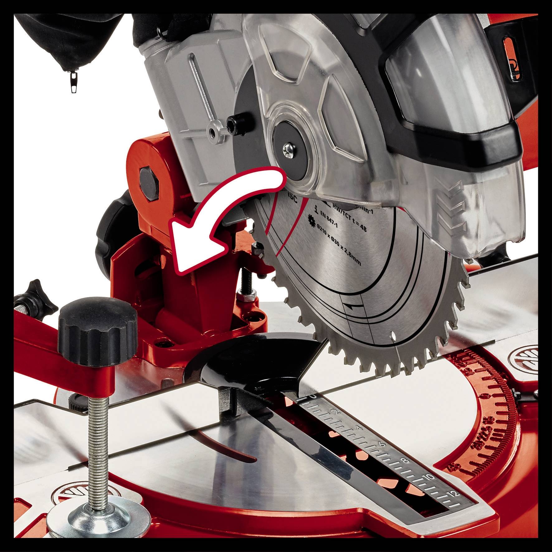 Circular saw with an arrow pointing to the angle setting adjustment. The scale shows precise angle adjustment options.