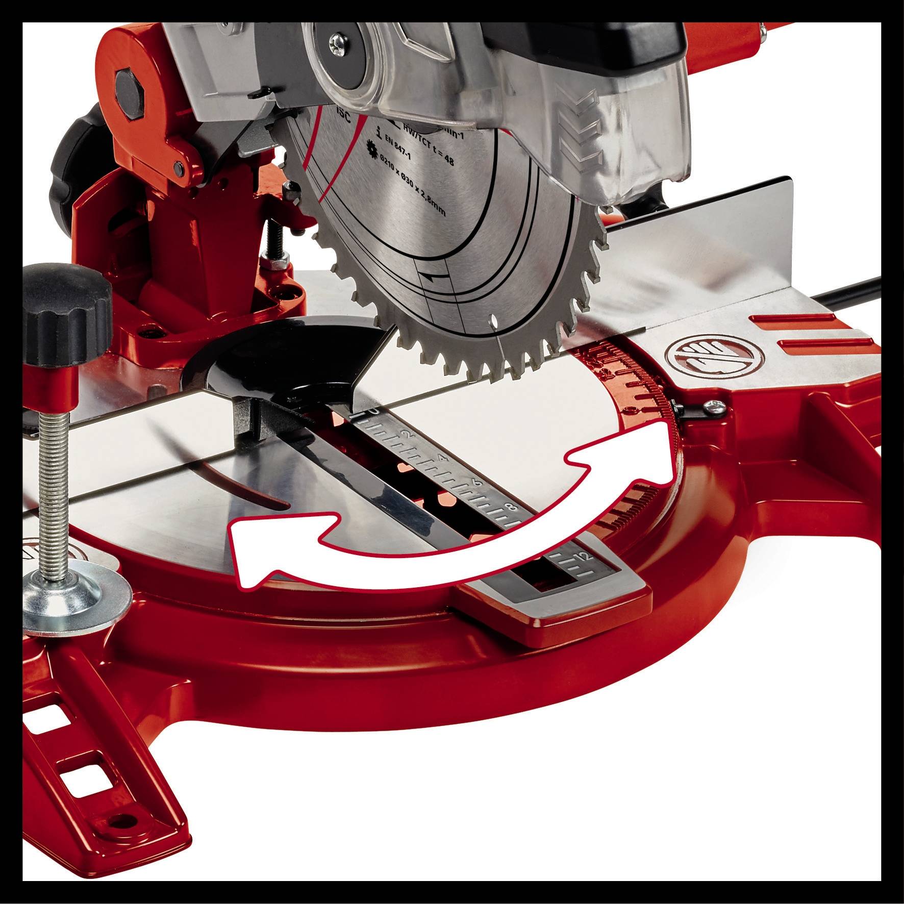 A red and silver reciprocating saw with a sharp, visible saw blade. The white arrow indicates the rotational movement of the saw bed.