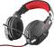 A black gaming headset with a microphone and red accents. It features large, padded ear cups and an adjustable headband.