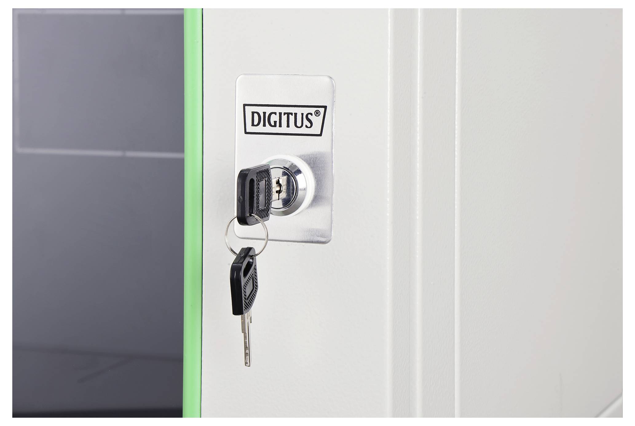 'A lock with keys inserted in a white panel labeled DIGITUS, against a backdrop with soft lighting.'