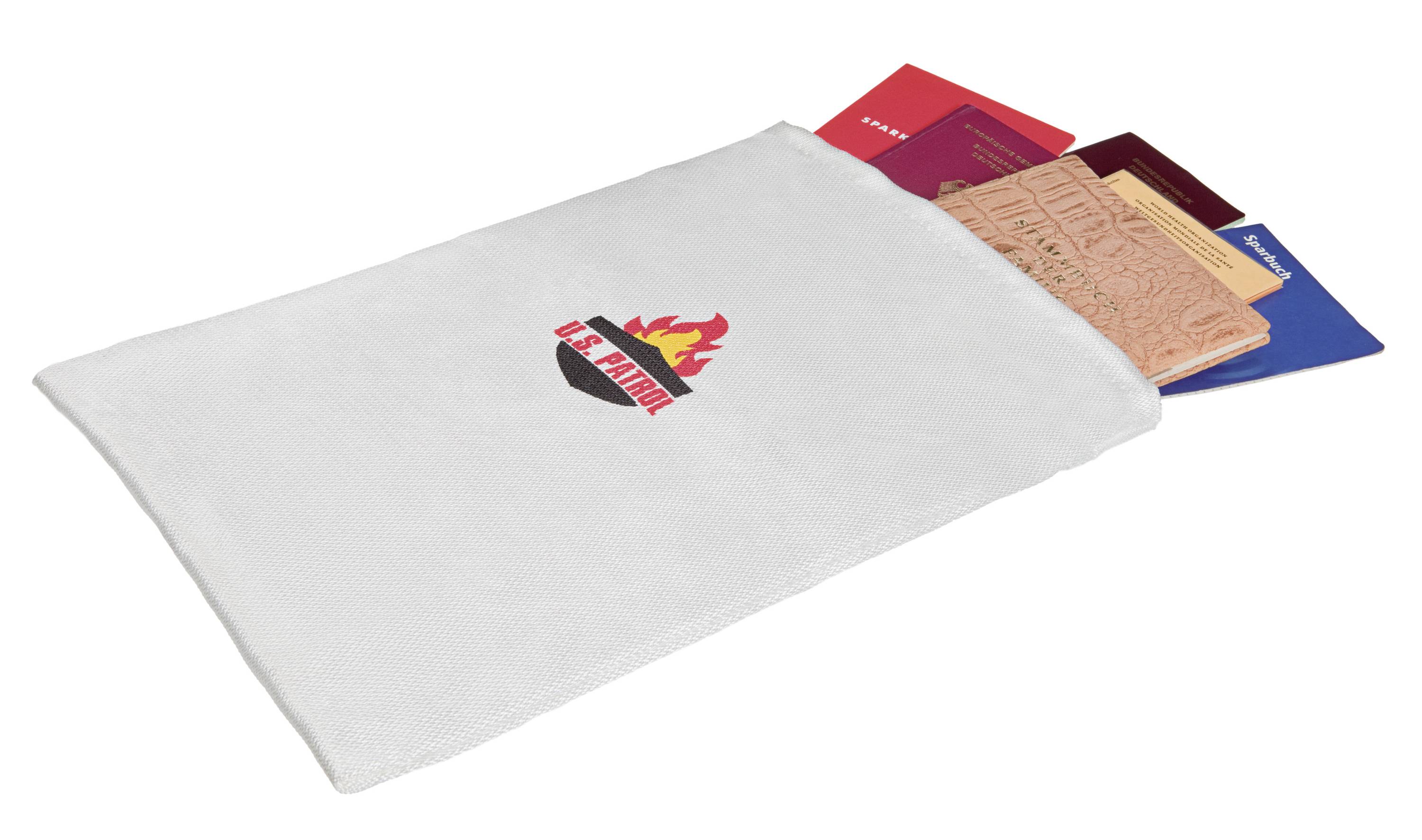 Fire-resistant bag with protective symbol lies on its side, contains important documents in various colours.