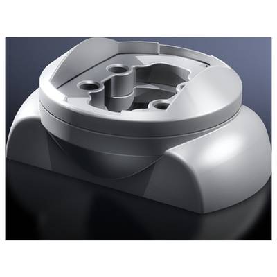 A grey, round plastic base with multiple openings on a dark surface.