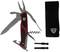 Multifunction tool with red handles, unfolded blades and accessory pouch clip. Includes pliers, knife, saw and screwdriver bits.