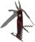 A red and black multi-tool knife with various tools including a blade, pliers, corkscrew, and screwdriver.
