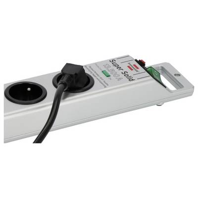 White power strip with two round sockets, a black plug inserted, and an illuminated green switch on the right.