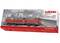 Packaging of a Märklin "Start Up" set featuring a red DB Class 218 diesel locomotive against a railway station background.