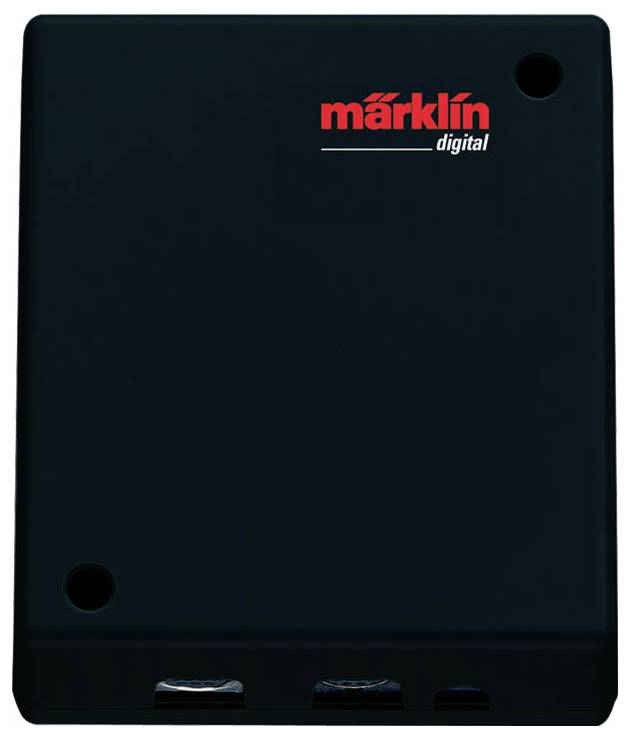 'Black square device with the red 'Märklin Digital' logo in the top right corner. It has connections at the bottom and two round indentations.'