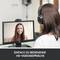 A person wearing headphones is having a video call with a woman on a monitor. Text below: 'Easy-to-use HD video calls'.