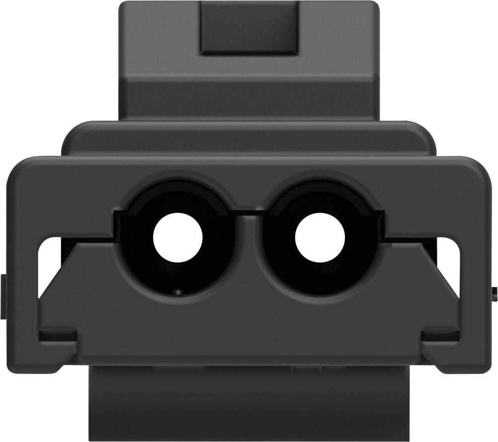 A black, rectangular technical component with two circular openings in the centre, potentially an electronic connector.