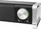 Stereo speakers with a large silver volume control and green indicator light, with two 3.5 mm connections alongside.