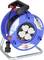 Blue cable reel with four electrical outlets, a red carry handle, and a power cord plugged in, on a metal stand.