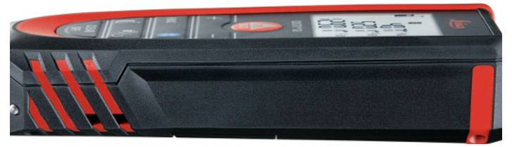 A close-up view of a red and black electronic laser distance measurer displaying various measurements on its digital screen.