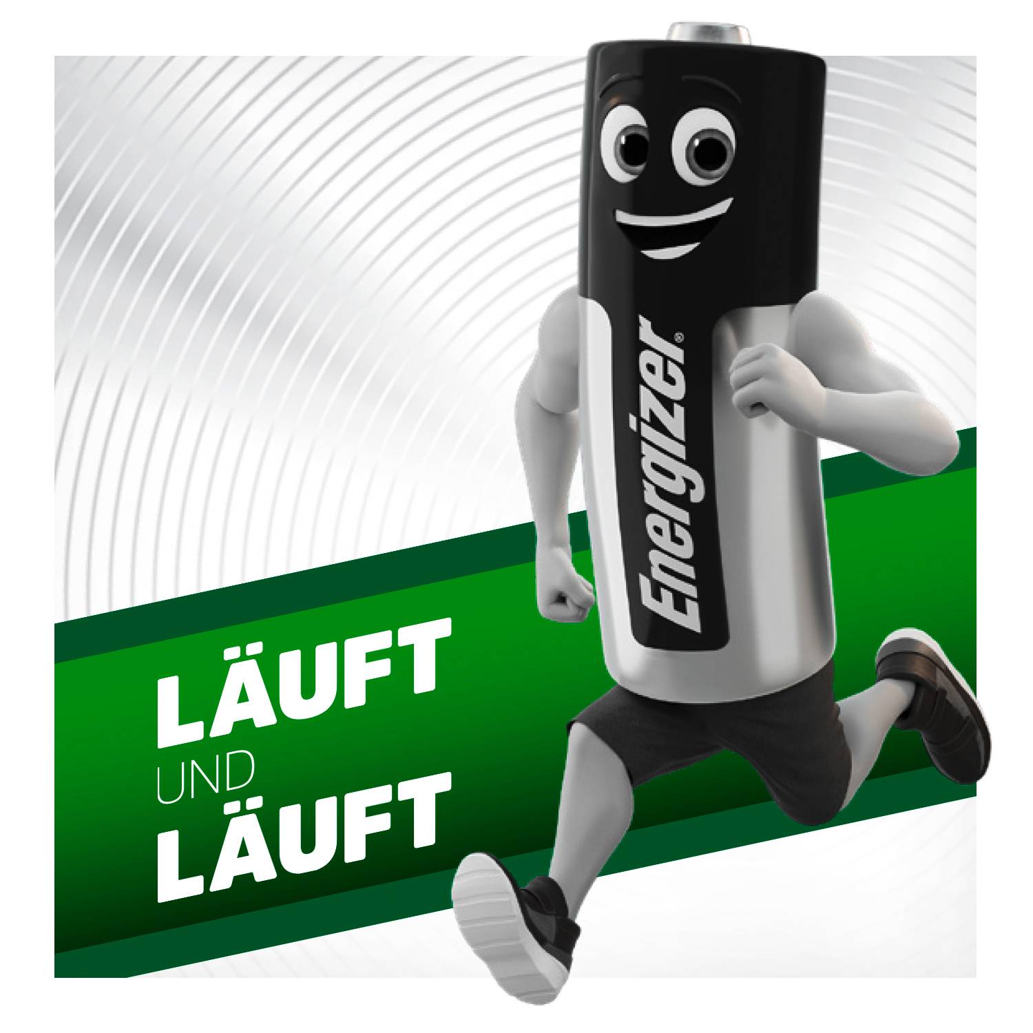 A running battery with a face and limbs. In the background on a green surface is the text 'Keeps going and going'.