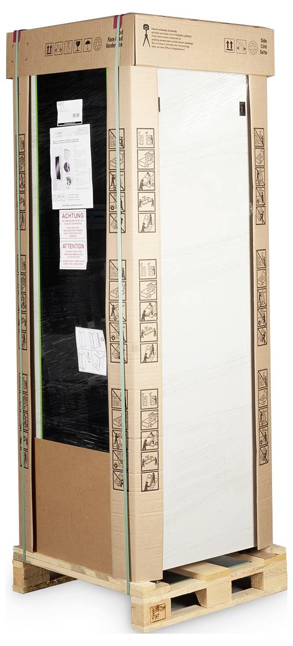 A packaged refrigerator stands on a pallet. The packaging displays installation instructions and symbols for safe transportation.