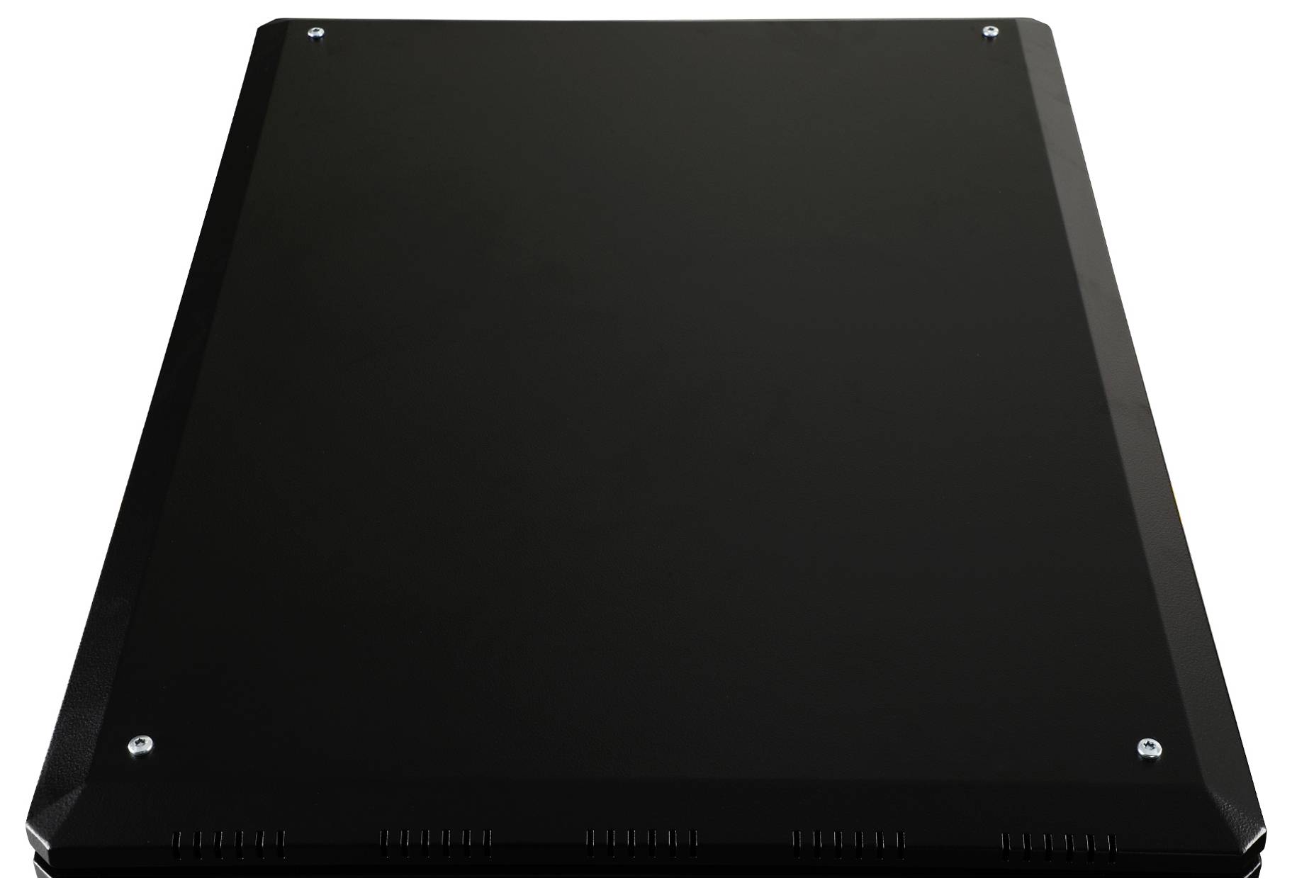 A rectangular, black solar panel with four visible screws at the corners, positioned on a white background surface.
