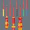 'A set of coloured screwdrivers with various heads and insulated handles for electrical work, on a grey background.'