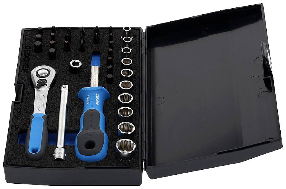 Toolkit with ratchet, screwdriver handle, socket inserts and bits in various sizes, arranged in a black box.