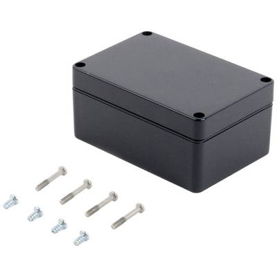A black, rectangular enclosure with rounded corners lies next to six screws.