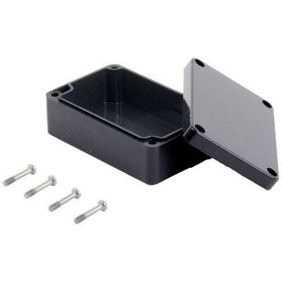 A rectangular black plastic enclosure with a removable lid lies open. Four silver screws are positioned beside it.