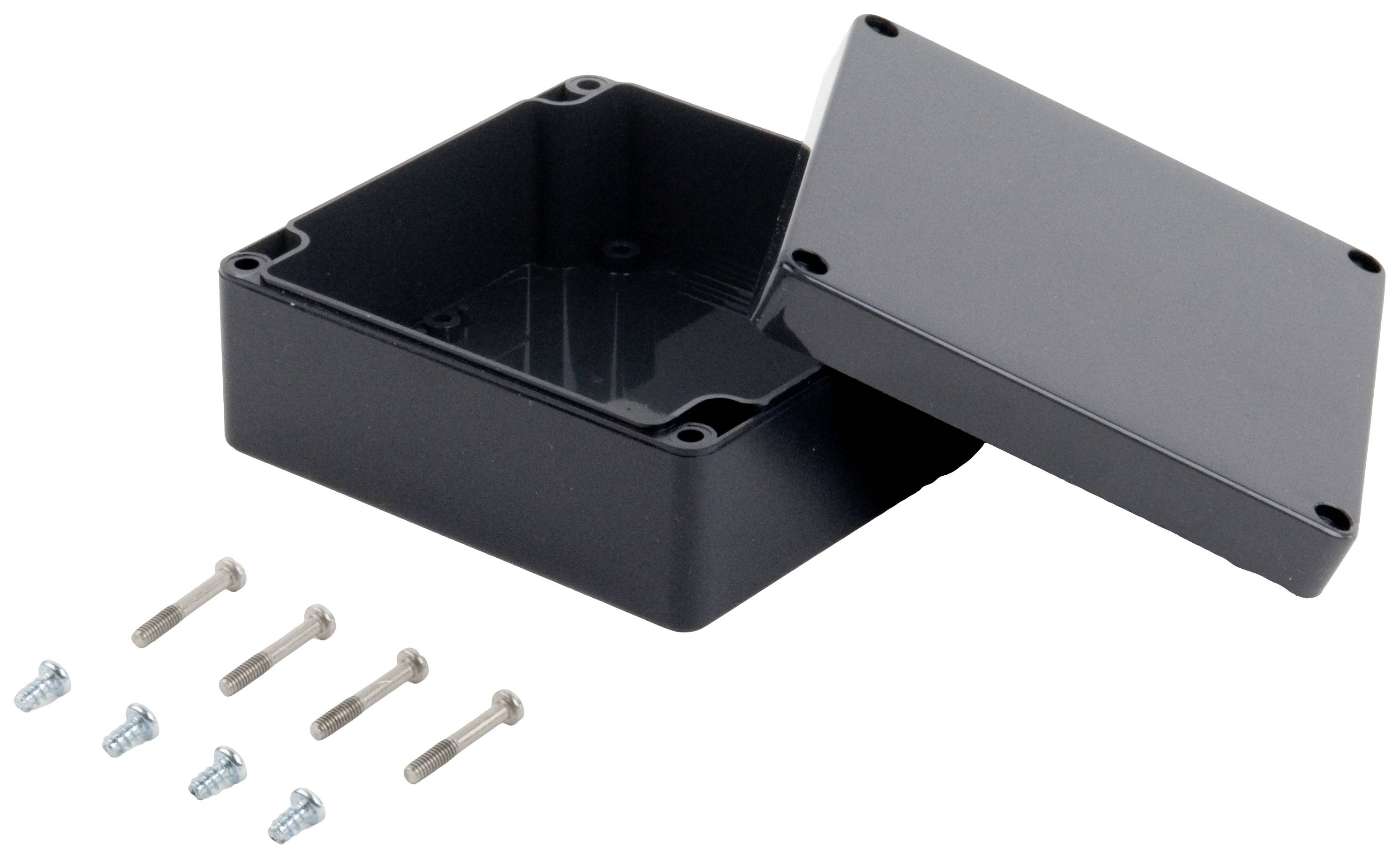 Black plastic housing with a removable lid, shown open, with four mounting screws beside it.