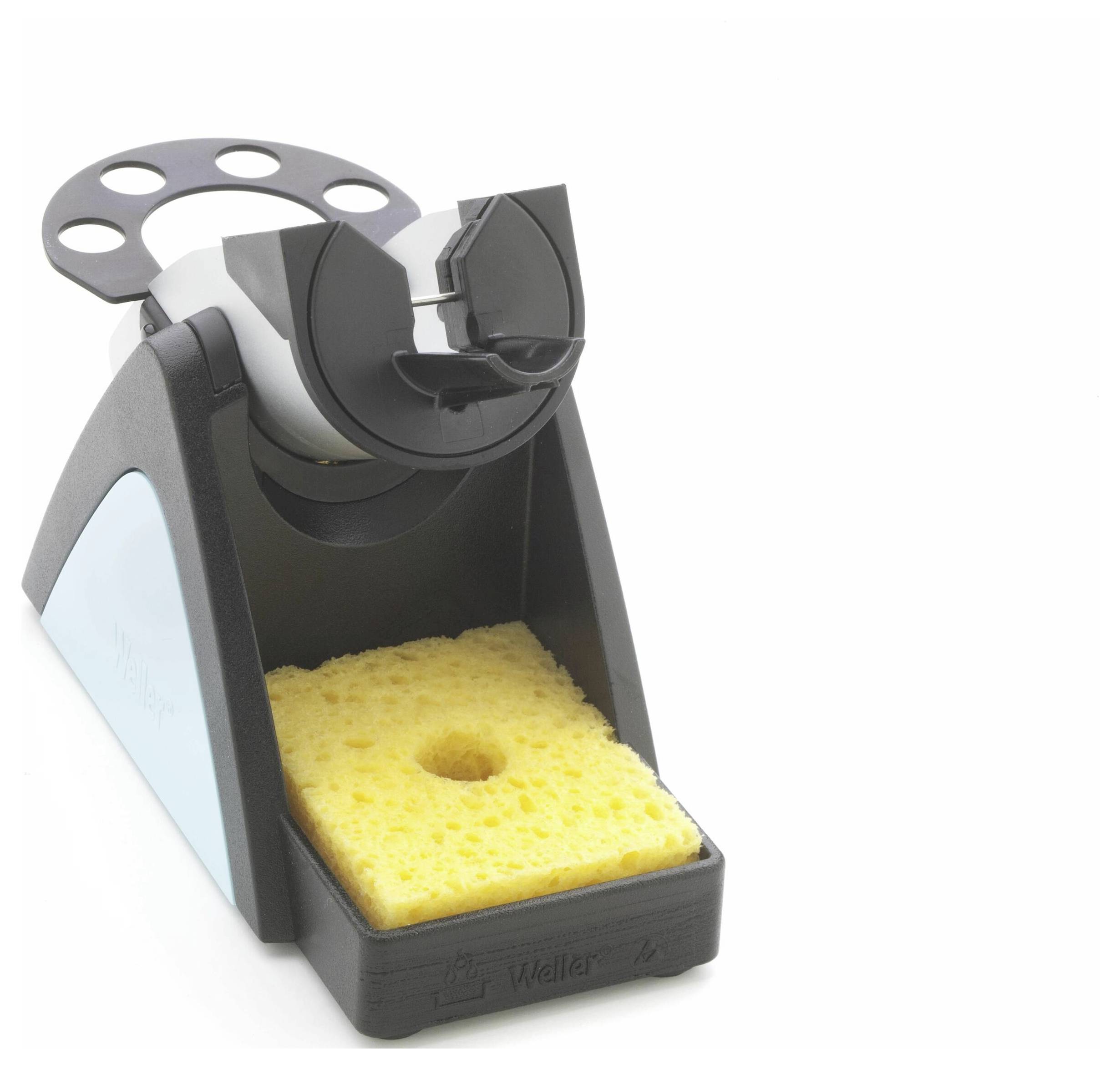 A black soldering iron stand with a yellow cleaning sponge.